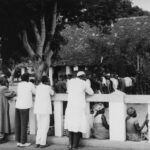 People queueing to vote at a polling station during presidential elections in Cameroon
